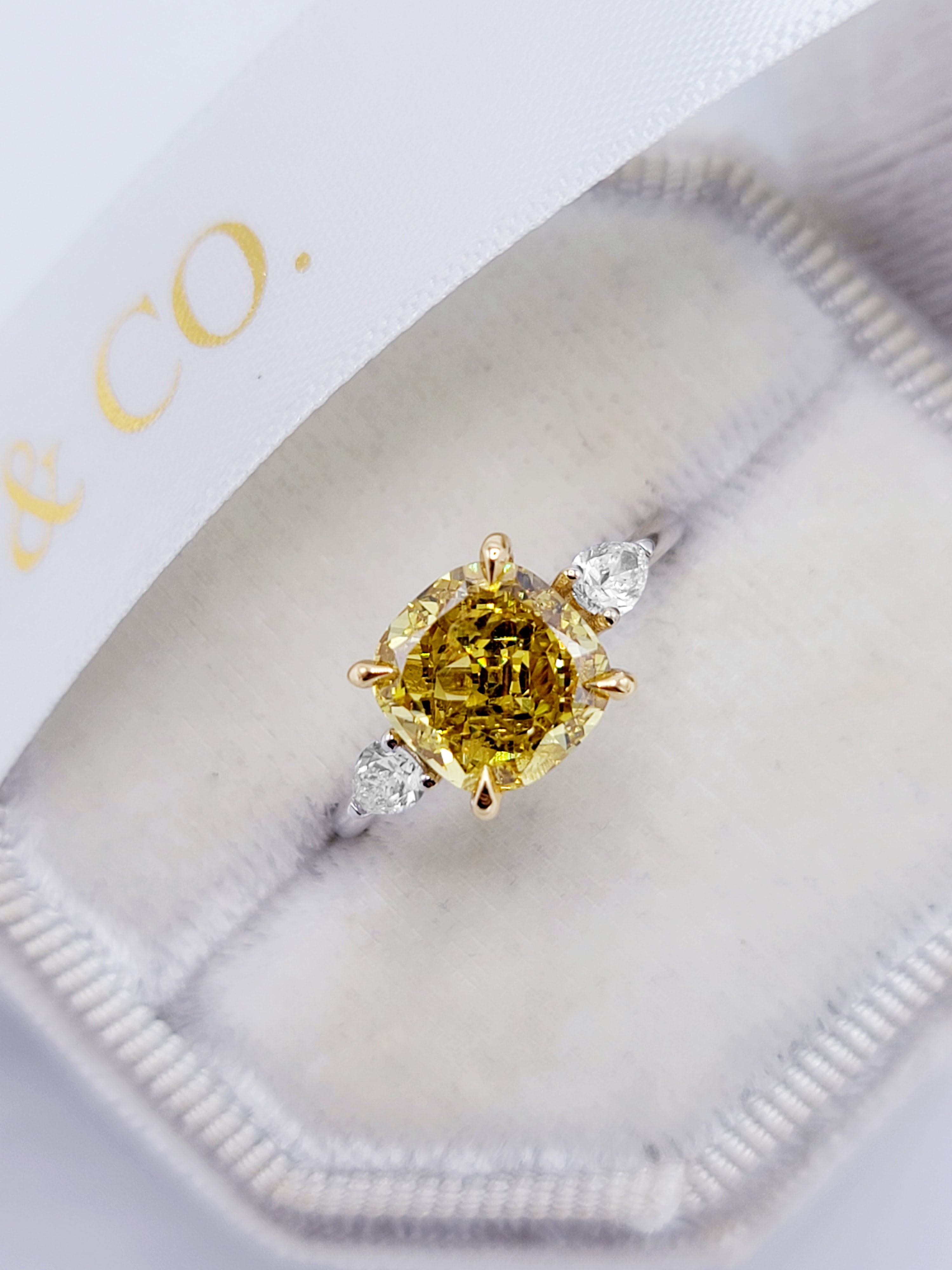 2.40 Carats Fancy Vivid Yellow Cushion Cut with 2 Pear Shape Side Ston –  Benz & Co Diamonds