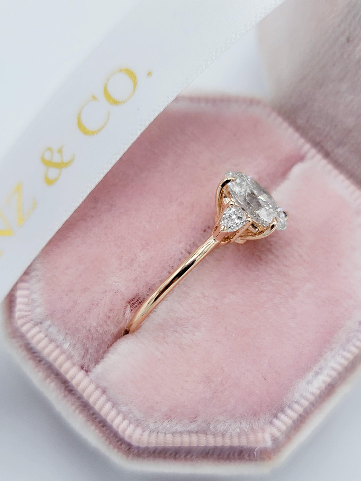 2.10 Carats Lab Grown Oval Cut with Pear Shape Side Stones Diamond Engagement Ring in Rose Gold - BenzDiamonds