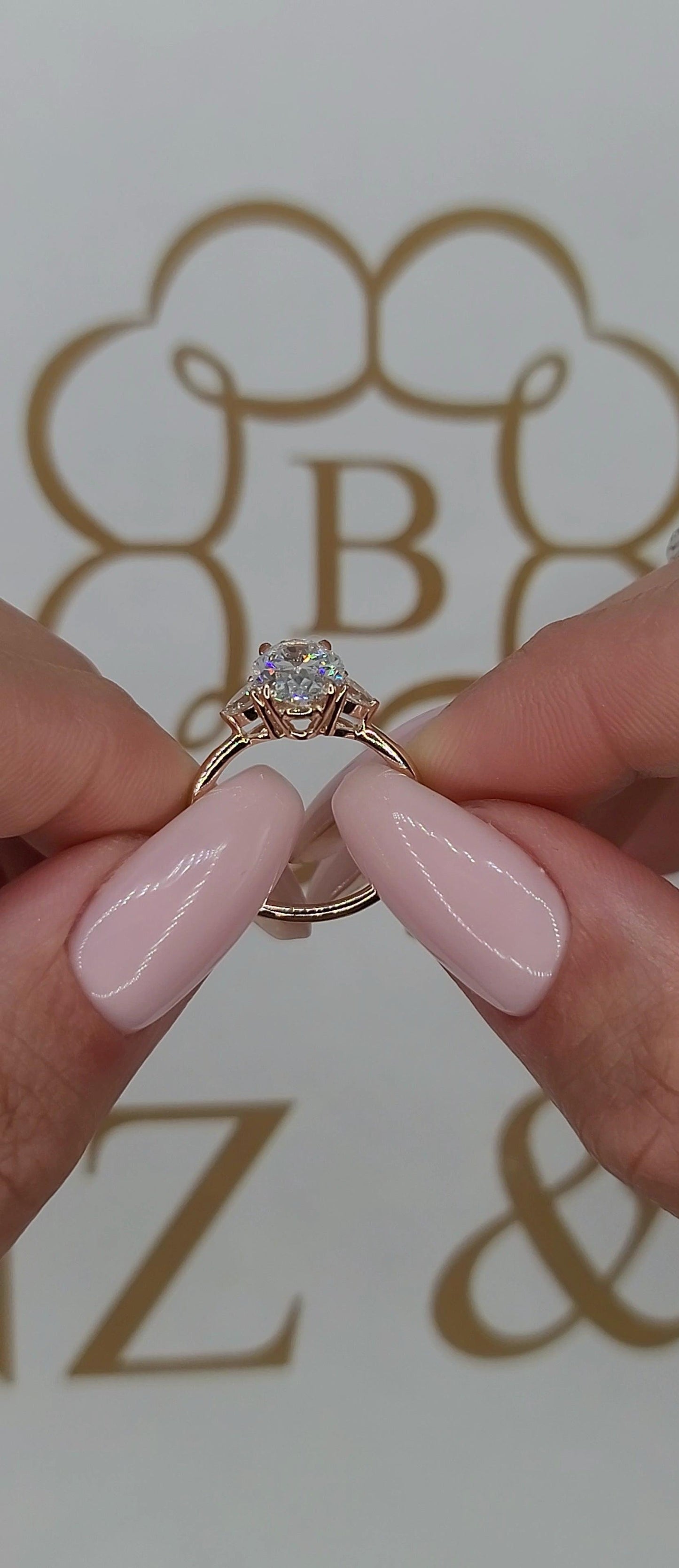 2.29 Carats Lab Grown Oval Cut with Pear Shape Side Stones Diamond Engagement Ring in Rose Gold - BenzDiamonds